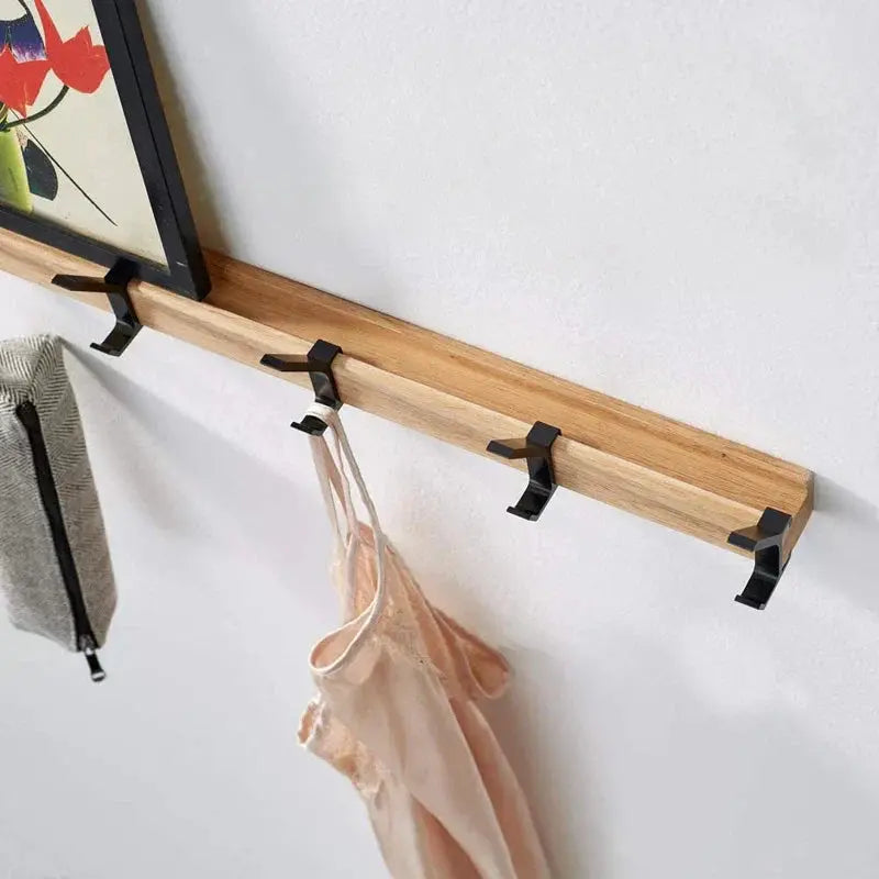 van hout en metaal – ruimtebesparende hakenstrip