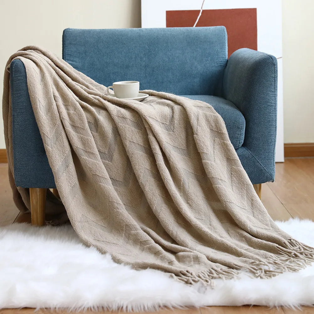 strikdeken met visgraatpatroon – zacht en decoratief