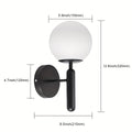 Glazen wandlamp met bolvorm voor een elegante sfeer